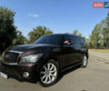 Красный Инфинити QX56, объемом двигателя 5.55 л и пробегом 213 тыс. км за 18800 $, фото 1 на Automoto.ua