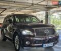 Красный Инфинити QX56, объемом двигателя 5.59 л и пробегом 176 тыс. км за 14600 $, фото 1 на Automoto.ua