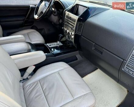 Серый Инфинити QX56, объемом двигателя 5.6 л и пробегом 300 тыс. км за 10000 $, фото 11 на Automoto.ua