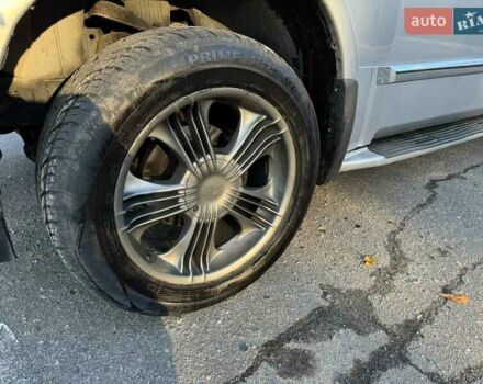 Серый Инфинити QX56, объемом двигателя 5.6 л и пробегом 300 тыс. км за 10000 $, фото 16 на Automoto.ua