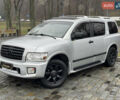 Серый Инфинити QX56, объемом двигателя 5.6 л и пробегом 206 тыс. км за 8000 $, фото 1 на Automoto.ua