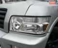 Серый Инфинити QX56, объемом двигателя 5.6 л и пробегом 206 тыс. км за 8000 $, фото 3 на Automoto.ua