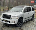 Серый Инфинити QX56, объемом двигателя 5.6 л и пробегом 206 тыс. км за 8500 $, фото 1 на Automoto.ua