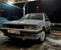 Серый Исузу Аска, объемом двигателя 2 л и пробегом 148 тыс. км за 600 $, фото 1 на Automoto.ua