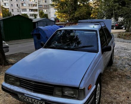 Серый Исузу Аска, объемом двигателя 2 л и пробегом 148 тыс. км за 600 $, фото 6 на Automoto.ua