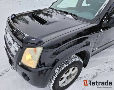 Чорний Ісузу D-Max, об'ємом двигуна 3 л та пробігом 296 тис. км за 7186 $, фото 3 на Automoto.ua