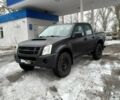 Черный Исузу Д-Макс, объемом двигателя 2.5 л и пробегом 300 тыс. км за 6000 $, фото 1 на Automoto.ua