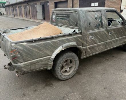 Зелений Ісузу D-Max, об'ємом двигуна 2.5 л та пробігом 288 тис. км за 2300 $, фото 5 на Automoto.ua