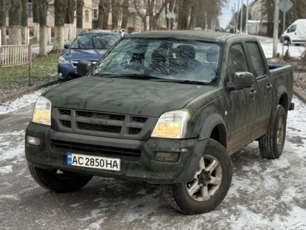 Зеленый Исузу Д-Макс, объемом двигателя 3 л и пробегом 287 тыс. км за 2850 $, фото 1 на Automoto.ua