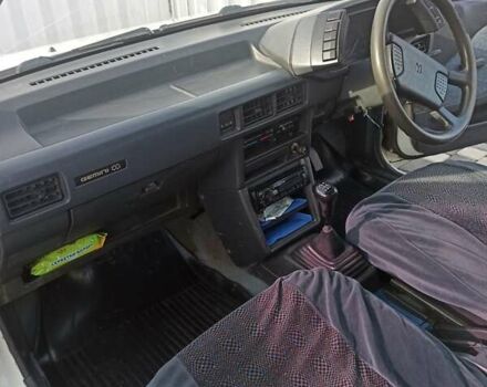 Білий Ісузу Джеміні, об'ємом двигуна 1.5 л та пробігом 368 тис. км за 700 $, фото 5 на Automoto.ua