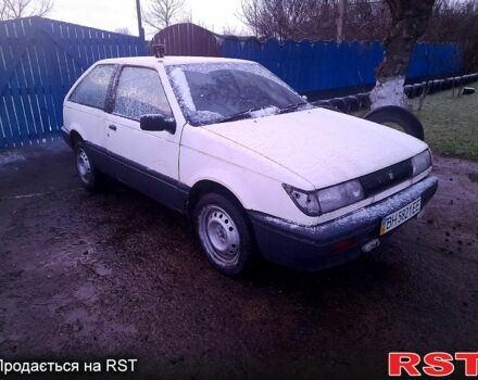 Белый Исузу Джемини, объемом двигателя 1.5 л и пробегом 102 тыс. км за 1000 $, фото 1 на Automoto.ua