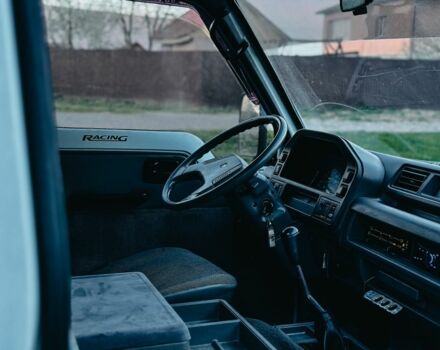 Білий Ісузу Midi пасс., об'ємом двигуна 2 л та пробігом 300 тис. км за 1850 $, фото 19 на Automoto.ua