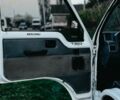 Білий Ісузу Midi пасс., об'ємом двигуна 2 л та пробігом 300 тис. км за 1850 $, фото 11 на Automoto.ua
