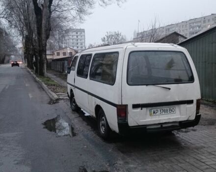 Белый Исузу Миди пасс., объемом двигателя 2 л и пробегом 300 тыс. км за 400 $, фото 1 на Automoto.ua