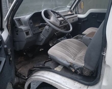 Белый Исузу Миди пасс., объемом двигателя 2 л и пробегом 300 тыс. км за 400 $, фото 3 на Automoto.ua