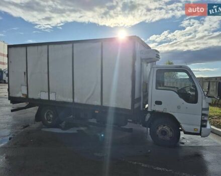 Белый Исузу НКР, объемом двигателя 4.57 л и пробегом 500 тыс. км за 8000 $, фото 3 на Automoto.ua
