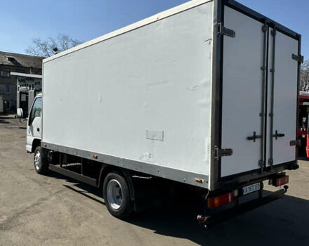 Белый Исузу НКР, объемом двигателя 4.57 л и пробегом 512 тыс. км за 13500 $, фото 2 на Automoto.ua