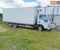 Белый Исузу НКР, объемом двигателя 4.57 л и пробегом 330 тыс. км за 9400 $, фото 1 на Automoto.ua