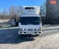 Белый Исузу НКР, объемом двигателя 4.75 л и пробегом 960 тыс. км за 8500 $, фото 1 на Automoto.ua