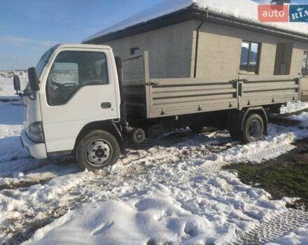 Белый Исузу НКР, объемом двигателя 4.57 л и пробегом 800 тыс. км за 16600 $, фото 2 на Automoto.ua