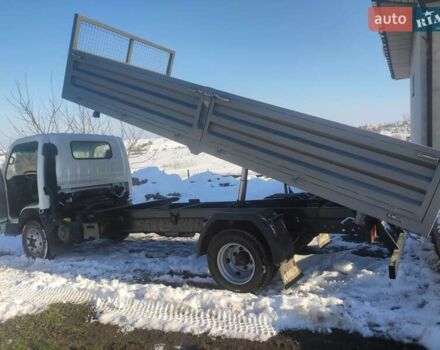 Белый Исузу НКР, объемом двигателя 4.57 л и пробегом 800 тыс. км за 16600 $, фото 5 на Automoto.ua