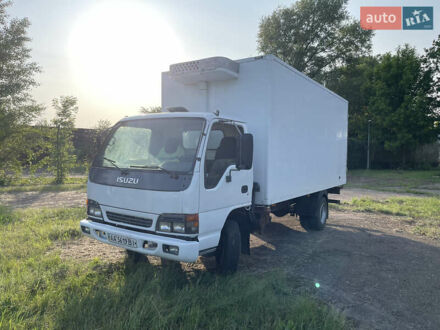 Белый Исузу НКР, объемом двигателя 4.57 л и пробегом 564 тыс. км за 10500 $, фото 1 на Automoto.ua