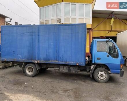 Синий Исузу НКР, объемом двигателя 5.19 л и пробегом 740 тыс. км за 6000 $, фото 1 на Automoto.ua