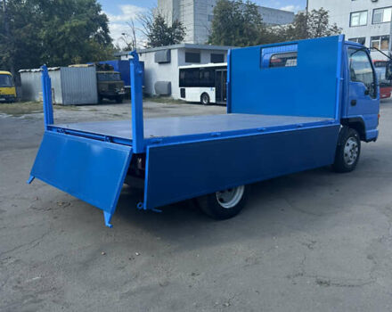 Синий Исузу НКР, объемом двигателя 4.57 л и пробегом 402 тыс. км за 14999 $, фото 3 на Automoto.ua