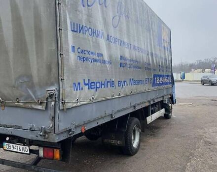 Синий Исузу НКР, объемом двигателя 5.2 л и пробегом 944 тыс. км за 7000 $, фото 3 на Automoto.ua