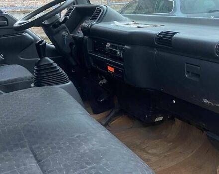 Синий Исузу НКР, объемом двигателя 5.2 л и пробегом 944 тыс. км за 7000 $, фото 7 на Automoto.ua