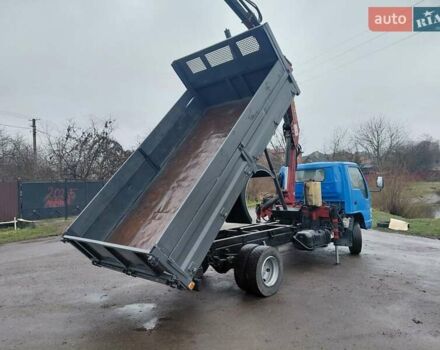 Синий Исузу НКР, объемом двигателя 4.7 л и пробегом 498 тыс. км за 23500 $, фото 3 на Automoto.ua