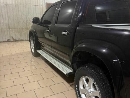 Черный Исузу Родео, объемом двигателя 2.5 л и пробегом 190 тыс. км за 8000 $, фото 1 на Automoto.ua