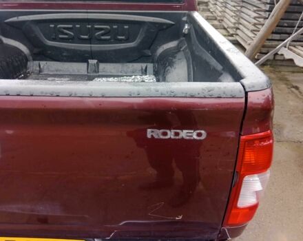 Червоний Ісузу Rodeo, об'ємом двигуна 3 л та пробігом 175 тис. км за 5196 $, фото 1 на Automoto.ua
