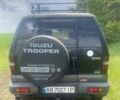 Чорний Ісузу Trooper, об'ємом двигуна 3.5 л та пробігом 386 тис. км за 7900 $, фото 1 на Automoto.ua