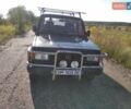 Черный Исузу Трупер, объемом двигателя 2.56 л и пробегом 550 тыс. км за 3800 $, фото 1 на Automoto.ua