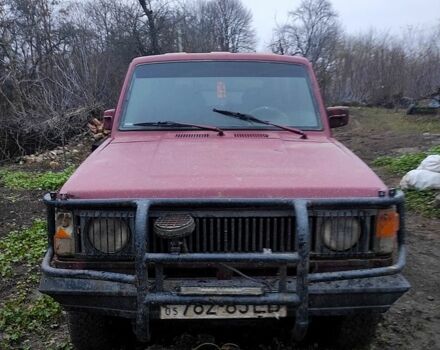 Красный Исузу Трупер, объемом двигателя 2.2 л и пробегом 300 тыс. км за 1900 $, фото 1 на Automoto.ua