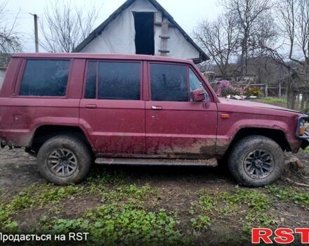 Червоний Ісузу Trooper, об'ємом двигуна 2.2 л та пробігом 300 тис. км за 1900 $, фото 1 на Automoto.ua