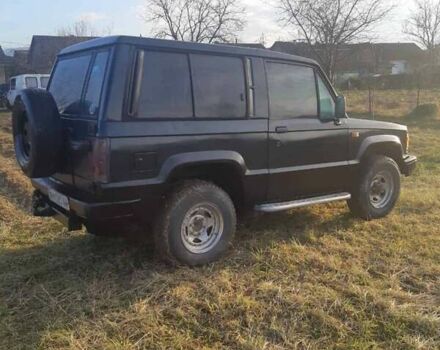 Синий Исузу Трупер, объемом двигателя 2.2 л и пробегом 300 тыс. км за 3500 $, фото 3 на Automoto.ua