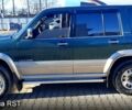 Зелений Ісузу Trooper, об'ємом двигуна 2.6 л та пробігом 300 тис. км за 7000 $, фото 2 на Automoto.ua