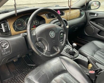 Черный Ягуар Х-Тайп, объемом двигателя 2.5 л и пробегом 142 тыс. км за 4200 $, фото 11 на Automoto.ua