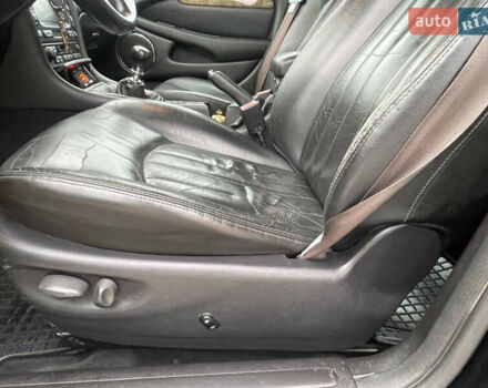 Черный Ягуар Х-Тайп, объемом двигателя 2.5 л и пробегом 142 тыс. км за 4200 $, фото 17 на Automoto.ua