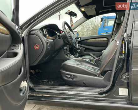 Черный Ягуар Х-Тайп, объемом двигателя 2.5 л и пробегом 142 тыс. км за 4200 $, фото 10 на Automoto.ua