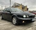 Черный Ягуар Х-Тайп, объемом двигателя 2.5 л и пробегом 142 тыс. км за 4000 $, фото 1 на Automoto.ua