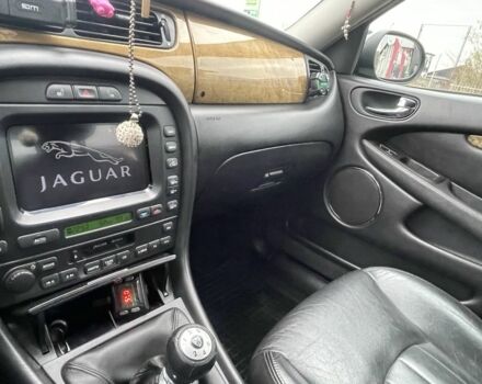 Черный Ягуар Х-Тайп, объемом двигателя 2.5 л и пробегом 142 тыс. км за 4200 $, фото 13 на Automoto.ua