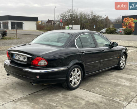 Черный Ягуар Х-Тайп, объемом двигателя 2.5 л и пробегом 142 тыс. км за 4200 $, фото 4 на Automoto.ua