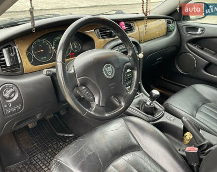 Черный Ягуар Х-Тайп, объемом двигателя 2.5 л и пробегом 142 тыс. км за 4200 $, фото 12 на Automoto.ua