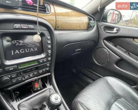 Черный Ягуар Х-Тайп, объемом двигателя 2.5 л и пробегом 142 тыс. км за 4200 $, фото 14 на Automoto.ua