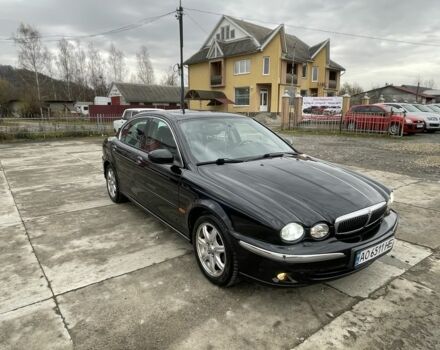 Черный Ягуар Х-Тайп, объемом двигателя 2.5 л и пробегом 142 тыс. км за 4200 $, фото 1 на Automoto.ua