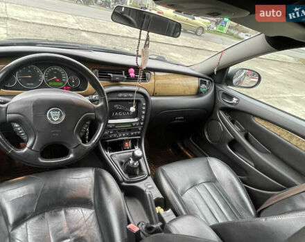 Черный Ягуар Х-Тайп, объемом двигателя 2.5 л и пробегом 142 тыс. км за 4200 $, фото 21 на Automoto.ua