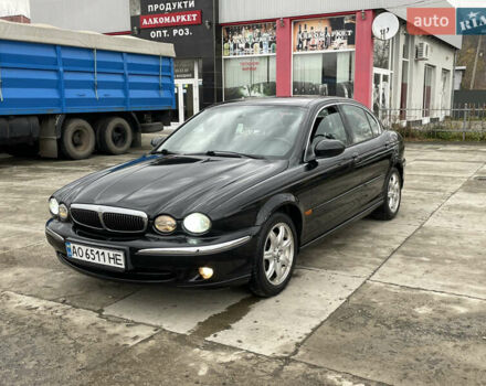 Черный Ягуар Х-Тайп, объемом двигателя 2.5 л и пробегом 142 тыс. км за 4200 $, фото 8 на Automoto.ua